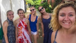 The author (center) and friends at Jaco Beach, Costa Rica